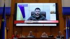 Volodymyr Zelenskiy speaks via a video link to the Romanian parliament in Bucharest on Monday. The Ukrainian president is due to address the Joint Houses of the Oireachtas on Wednesday. Photograph: EPA