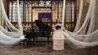 Musicians performing at the Crimea Memorial Church during the Sudi Etuz presentation in the course of Fashion Week in Istanbul. Photograph: Ekrem Serif Egeli/Getty Images for IHKIB