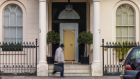 A temporary metal security door at 5 Belgrave Square in London on Monday, after people protesting the invasion of Ukraine occupied the mansion, reportedly owned by members of billionaire Oleg Deripaska’s family. Photograph: Jason Alden/Bloomberg