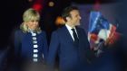 French president  Emmanuel Macron and his wife Brigitte Macron celebrate after his victory in France’s presidential election, at the Champ de Mars in Paris. Photograph:  Bertrand Guay / AFP via Getty 
