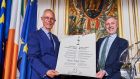 Parliamentary Assembly of the Council of Europe president Tiny Kox (left) presents the award parchment to Nano Nagle Place chief executive Shane Clarke