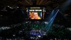 Katie Taylor talks to a reporter in the ring after defeating Amanda Serrano at Madison Square Garden in New York on Saturday night. Photograph: Jason Szenes/EPA