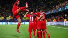 Sadio Mane celebrates with team-mates Virgil van Dijk, Mohamed Salah, , Thiago Alcantara and Andy Robertson  after scoring his side’s third goal during the  Champions League semi-final second leg against Villarreal  at Estadio de la Ceramica. Photograph: Eric Alonso/Getty Images