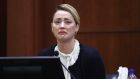   Amber Heard testifies in the courtroom at the Fairfax County circuit court in Fairfax, Virginia. Photograph: Jim Lo Scalzo/Pool Photo via AP