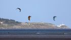  Kitesurfing off Dollymount, north Dublin, with Howth lighthouse in the background. Photograph Nick Bradshaw/The Irish Times