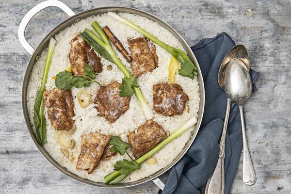 Spiced ling with fragrant coconut rice and spring onions