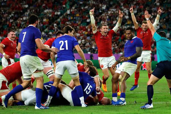 Wales fight back from the brink to deny 14-man France