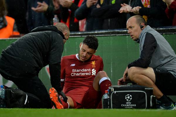 Alex Oxlade-Chamberlain out for season and World Cup with knee injury