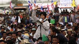 Thai government supporters vow to ‘deal with’  protesters