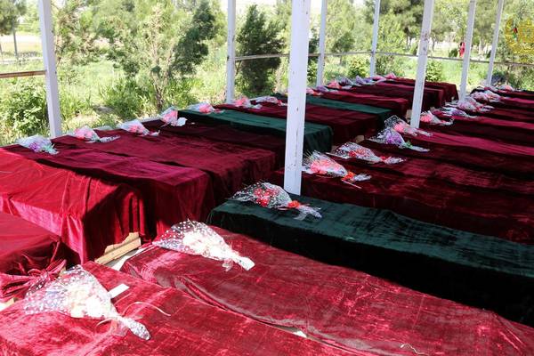 Afghan day of mourning follows scores of deaths in Taliban attack