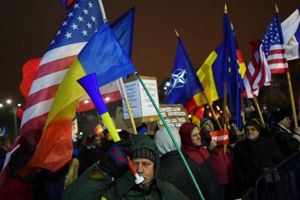 Romania’s  government holds on and calls for an end to protests