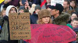 Hundreds rally in Belfast against Covid-19 certification scheme