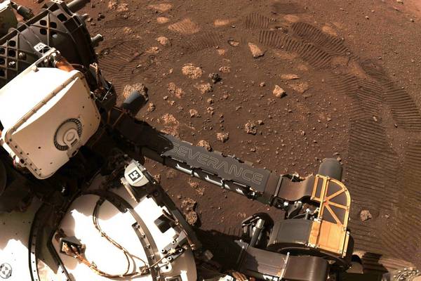 Nasa’s new Mars rover hits the dusty red road in first trip