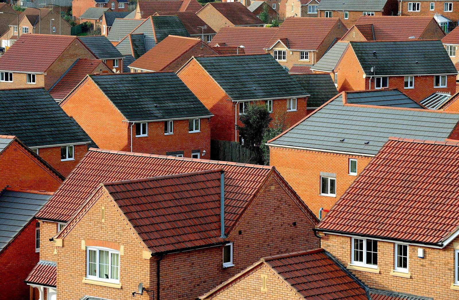 File photo dated 22/01/08 of houses as more than a million struggling British families are spending at least a third of their income on housing costs, a think-tank has revealed today. PRESS ASSOCIATION Photo. Issue date: Thursday May 16, 2013. Work by the Resolution Foundation shows 1.3 million households on low to middle incomes are spending more than they can reasonably afford on mortgage payments, rent and maintenance costs - forgoing other essentials such as food to pay their bills. See PA story MONEY Housing. Photo credit should read: Rui Vieira/PA Wire