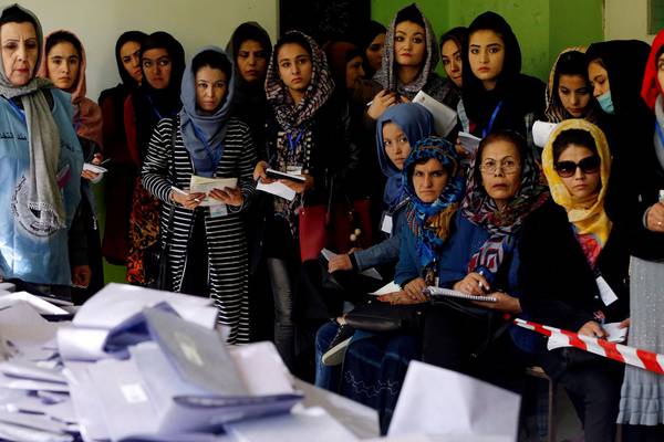 Afghans shut out by polling station chaos try to vote again