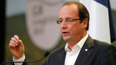 Hollande faces wrath of unions at social conference