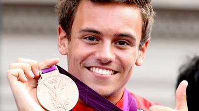 Tom Daley announces relationship with man in video