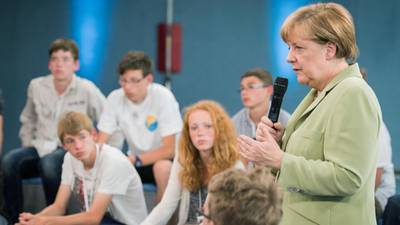 Merkel’s  meetings highlight gap between young and old