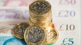 UK pauses drive to raise minimum wage