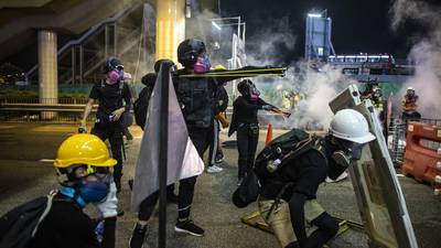 Beijing issues warning as Hong Kong braces for general strike
