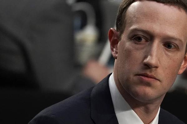 Zuckerberg suits up for a stiff delivery before Congress