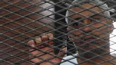 Journalist gives up Egyptian passport