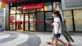 Santander restructuring costs cause 18% dip in profit