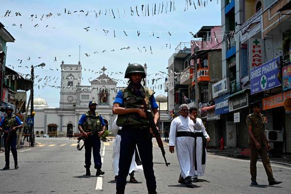 Death toll in Sri Lanka bombings revised down by about 100