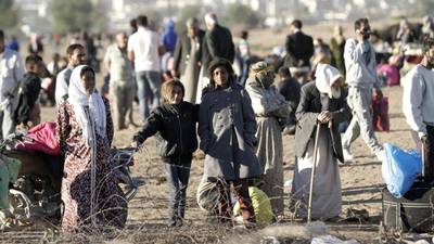 Over 130,000 fleeing Syrian Kurds cross into Turkey