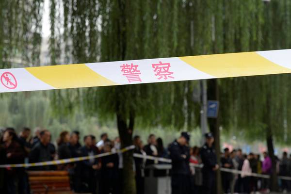 Woman injures 14 children in kindergarten knife attack in China