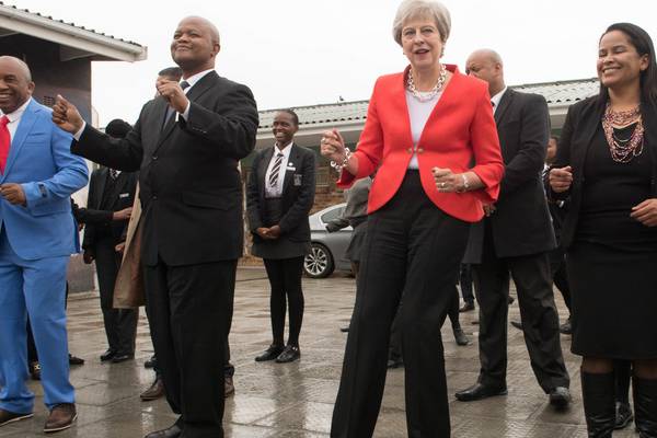 Dancefloor diplomacy: Theresa May dances with school kids in Cape Town