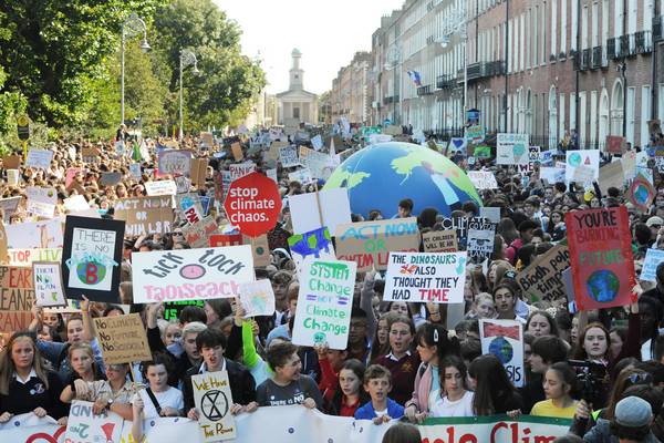Excited and enraged, children take to Dublin’s streets as part of global protest