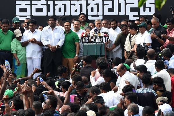 Angry Sri Lankans take to street in support of ousted PM