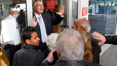 Cyprus bank depositors angry and frightened