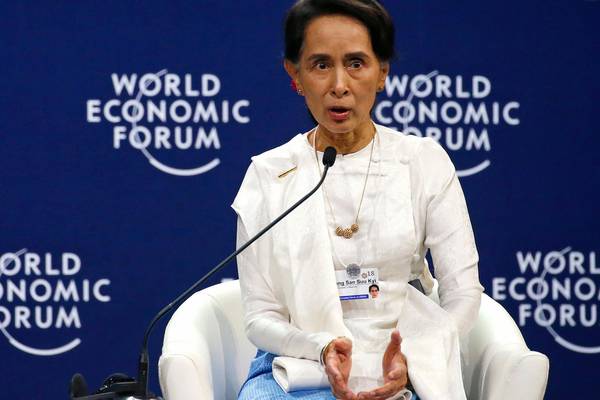 Aung San Suu Kyi defends jailing of Reuters journalists