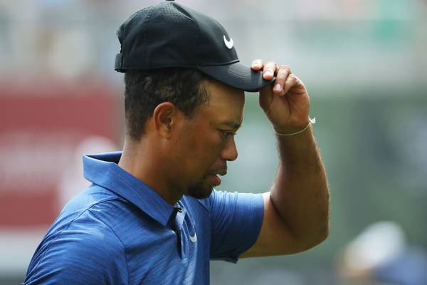 Tiger Woods cancels press conference due to back spasms