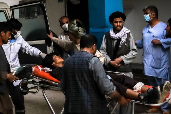 Multiple explosions at school in Afghan capital kill 40, injure dozens