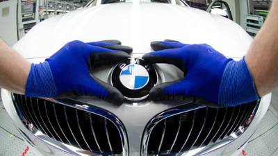 BMW trims year’s car sales expectations as profits surge