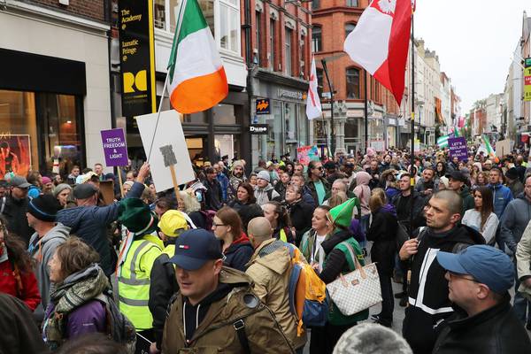 Anti-mask campaigners hold sit-down protest on Grafton Street