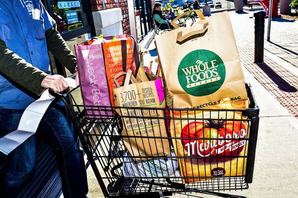 Amazon cuts Whole Foods prices as much as 43% on first day
