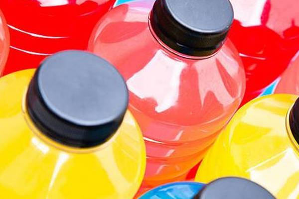 Sugar content of some energy drinks has fallen, but bottles and cans are bigger