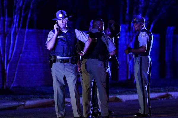 Policeman killed, six hurt as US gunman takes children hostage