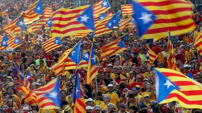 Barcelona fans can wave Catalan flags at cup final, says judge
