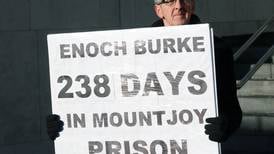 Burke family members protest after they are excluded from Enoch Burke's Court of Appeal hearing