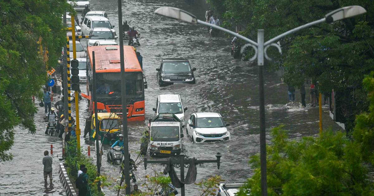 Eleven killed in India as record rainfall causes travel disruption