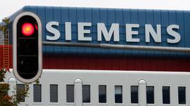 Siemens sees profit growth speeding up this year