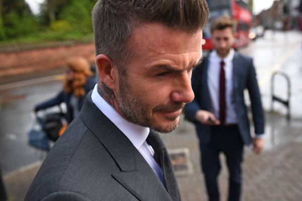 Defend it like Beckham: Football star disqualified for using phone in Bentley