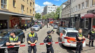 German police fire shots at axe-wielding person at Hamburg soccer fan parade