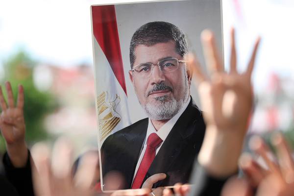 Egypt’s Morsi buried one day after collapsing in courtroom