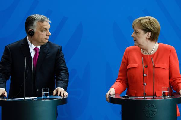 Merkel and Orban vie for upper hand on humanity and borders